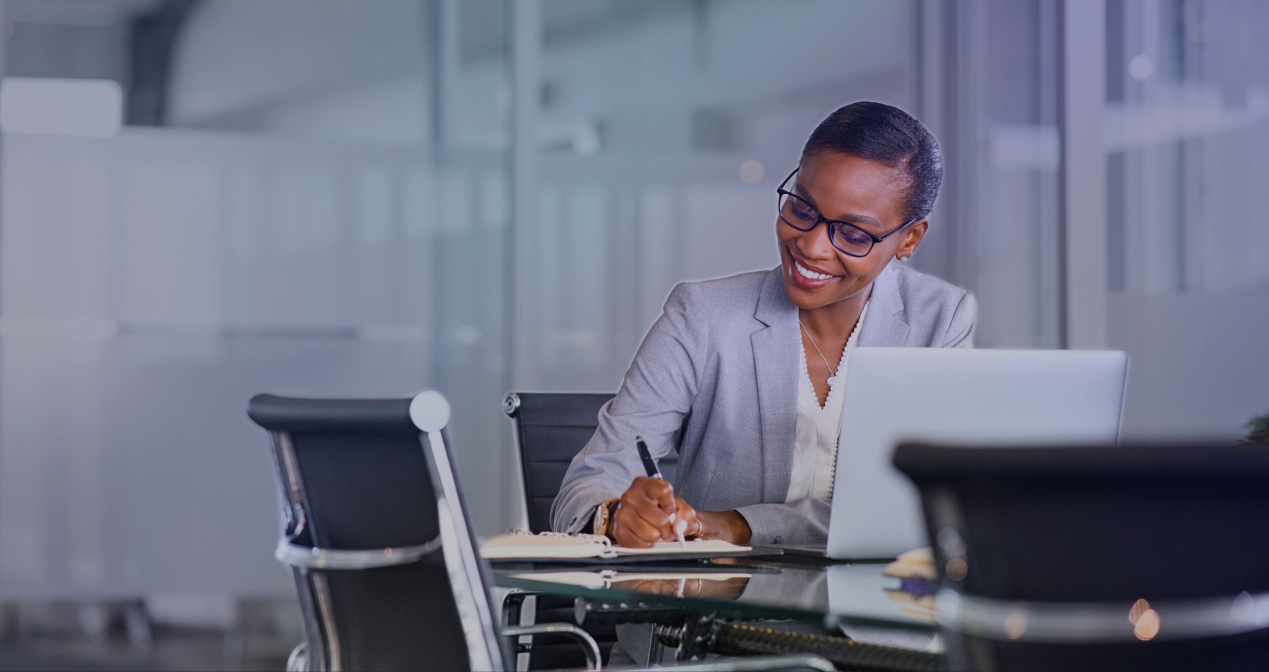 Woman working at a laptop